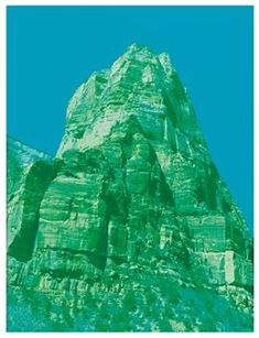 an image of a mountain with blue sky in the background