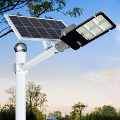 a solar powered street light on a pole