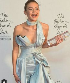 the actress poses with her award for best performance in a musical role at the 70th anniversary celebration