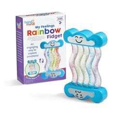 the rainbow fidget toy is next to its box