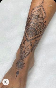 a person with a tattoo on their leg