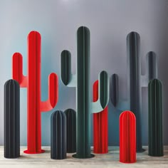 an assortment of different colored cactus sculptures