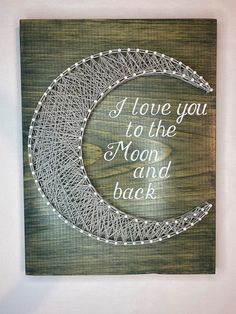 a string art piece with the words i love you to the moon and back