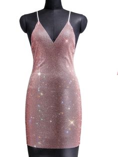 Rhinestone see through sparkling dress. SIZE Bust: 31-43” Waist: 31-39” Length:32” Pink Dress For Prom Season Club, Summer Sequin Dress With Rhinestones, Mesh Dress With Rhinestones For Party Season, Glamorous Pink Backless Sequin Dress, Pink Fitted Mini Dress With Rhinestones, Pink Embellished Backless Mini Dress, Pink Embellished Club Dress, Glamorous Pink Bodycon Dress For Prom Season, Glamorous Pink Bodycon Dress For Prom