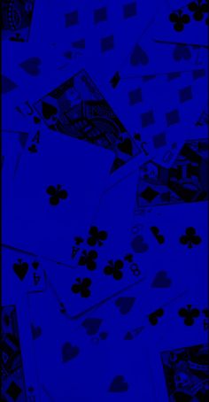 blue playing cards are scattered on top of each other in the air, with hearts and spades all over them