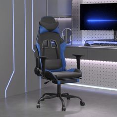 a chair that is sitting in front of a computer