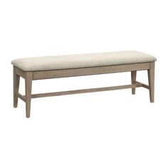 the bench is made from wood and has a beige upholstered cushion on it