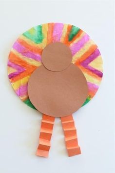 a paper plate with a turkey cut out of it's side and some tape