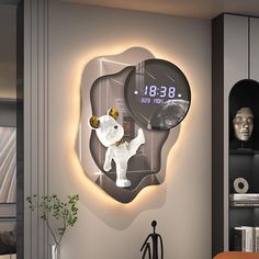 a clock that is on the side of a wall next to a table and chair