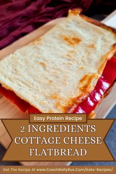 two ingredients cottage cheese flatbread on a cutting board with text overlay that reads, easy protein recipe 2 ingredients cottage cheese flatbread