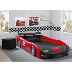 a race car bed is shown in this room