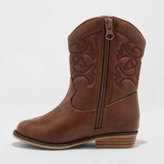 Your little one will love adding these Memphis Western Boots from Cat & Jack™ to a variety of outfits to create lots of cute country looks. These toddler western boots feature the classic cowpoke silhouette with stitched details on the upper, pointed toes, and a petite 1-inch kitten heel for just a little hint of height, but they also allow for easier on and off for little ones thanks to a full zipper on the inside of each boot. Toddler Cowgirl Outfit, Cowgirl Boots For Kids, Toddler Cowgirl, Country Looks, Toddler Cowboy Boots, Western Inspired Outfits, Girls Cowgirl Boots, Cute Country