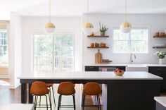 the kitchen is clean and ready to be used as a dining room or living room