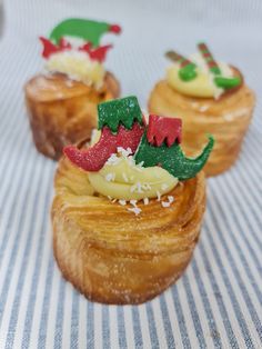 three small pastries are sitting on a table