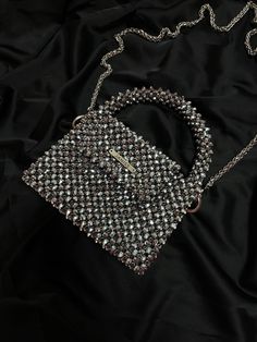 Luxury Black Beaded Bags, Sparkling Crystal Bags For Party, Silver Top Handle Party Bag, Rectangular Silver Evening Bag, Chic Embellished Crystal Evening Bag, Silver Rhinestone Shoulder Bag For Night Out, Silver Top Handle Clutch For Party, Black Evening Bags With Bling, Luxury Silver Shoulder Bag For Party