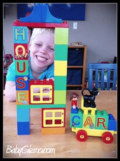 a child's photo frame made out of lego blocks