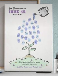 a poster with the words in french on it and a plant growing out of it