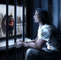 a man sitting in front of a window next to a woman with long black hair