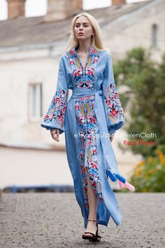 Light blue linen vyshyvanka maxi embroidered Kaftan embrodered boho tunic with multicolored embroidery Ukrainian clothing bohemian style  Free regular Shipping. This dress is made with light blue linen and decorated with multicolored silk embroidery Dress has pockets and belt and hidden buttons