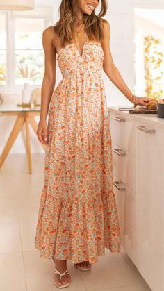 Step into a dream with our Bohemian Floral Halter Maxi Dress. A fusion of elegance and whimsy, it’s your perfect pick for sun-kissed days. Fancy Tropical Outfit, Wedding Guest Maxi Dress Summer, Hawaii Dresses Outfit Ideas, Cute Summer Dresses Long, Sun Dresses Casual, Long Sun Dresses, Honeymoon Fits, Orange Bridesmaids, Maxi Dress Outfit Summer