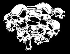 a bunch of skulls that are in the shape of a skull on a black background