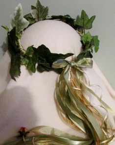 Faux  ivy leaves with coordinating ribbons, two with tiny gold colored rosebuds at the ends. This wreath is an especially versatile style for weddings, fairs, concerts, parties, plays, and many other different events and outfits. Please note that you are ordering a wreath that will be made to order, this allows me to make a custom designed wreath for you, you can have your wreath made to look just like the wreath in the picture, or you can have changes made to better reflect the colors and style of your event or outfit. If you choose to have changes made that involve adding or omitting certain colors of flowers, and/or ribbons, there would be no additional charge, the only time there may be an additional charge, would be if you wanted items that were not on the original design, shown in th Bridesmaid Crown, Floral Crown Wedding, Prom Decor, Ivy Leaves, Flower Girl Crown, Head Wreath, Flower Crown Wedding, Ivy Leaf, Craft Wedding