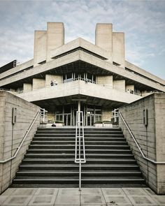 an architectural building with stairs leading up to it