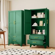 a green armoire with two drawers and one door open in a living room area