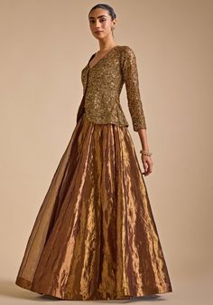 Step into elegance with Gold Embroidered Jacket Set. Crafted from luxurious blended silk, this stunning jacket features intricate zardozi and sequin embroidery detailing that exudes sophistication. The jacket's opulent design is perfectly complemented by a flared skirt, creating a harmonious blend of tradition and contemporary style. A perfect indo western outfit a bride or bride to be for Cocktail parties or Reception Night. Composition : Jacket - Blended Silk, Skirt - Tissue Care: Dry Clean On Two Piece Outfits Indian Wedding, Latest Indo Western Outfits Wedding, Jacket Style Dresses Indian, Indo Western Outfits Wedding, Skirt And Top Indian, Tissue Dress, Sequins Outfit, Indo Western Outfit, Blazer With Skirt