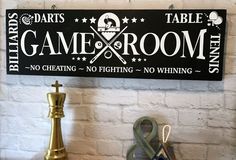 a game room sign hanging on the wall