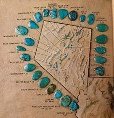 an old book with turquoise colored rocks and arrows pointing to the different locations in it