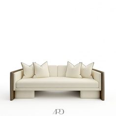 a white couch with four pillows on it's back and the word d is for design