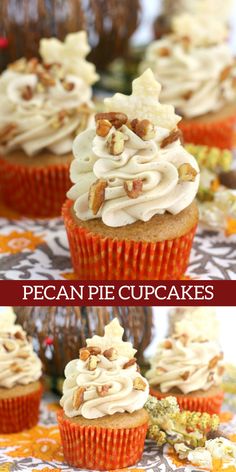 some cupcakes with white frosting and pecans on top are sitting on a table