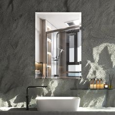 a bathroom sink sitting under a mirror next to a shelf