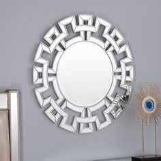 a mirror that is sitting on top of a table