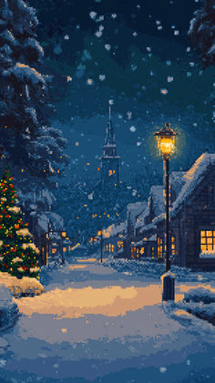 a snowy street at night with a lit christmas tree