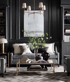 a living room with black walls and furniture