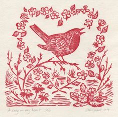 a red bird sitting on top of a tree branch surrounded by flowers and leaves in a heart shaped frame