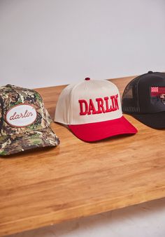 3D Embroidered "DARLIN'" Mid profile snapback Adjustable snapback closure One size fits most Structured Firm Front Panel 65% Polyester 35%Cotton Trendy Baseball Hats, Fun Snapback Trucker Hat For Streetwear, Fun Cotton Snapback Trucker Hat, Fun Snapback Trucker Hat With Patches, Retro Snapback Trucker Hat, Red Hat Outfit, Vintage Snapback Trucker Hat For Country Events, Hats Ideas, Womens Hats