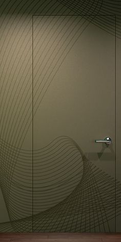 a glass shower door with an artistic design on it