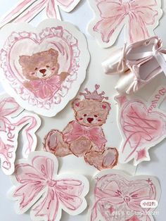 pink teddy bear stickers with hearts and bows on them are shown in the shape of heart shapes