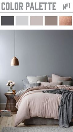 a bedroom with grey walls and pink bedding