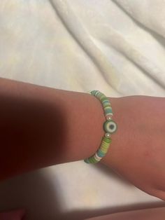 Green evil eye claybead bracelet Green Ojo Bracelet, Claybead Bracelet, Green Evil Eye, Evil Eye, Halloween Shopping, Beauty Book, Jewelry Bracelets, Beaded Bracelets, Accessory Gift