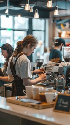 a woman working at a coffee shop