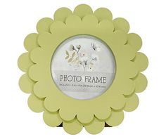 a white and yellow photo frame with flowers in the center, on a white background