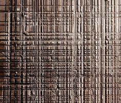 an old wooden wall with some lines on it