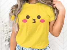 Express with Emoji: Yellow Shirt Collection 😀 Elevate your wardrobe with our emoji-inspired yellow shirts, adding a dash of fun and expression to your style. Why Choose Our Emoji Yellow Shirts? ✨ Support a Small Business: Your purchase directly supports our creative journey, helping us bring more cheerful designs to life. 😃 Express Yourself: Wear the iconic emoji face proudly and let your emotions shine through your fashion. 🌟 Premium Quality: Crafted with care, our shirts offer comfort and vibrant style, perfect for a pop of color. 🎁 Perfect Gift: Share the joy of expression with a friend, and gift them a shirt that's as bright as their smile. Join us in celebrating the art of expression. Shop now and add a touch of cheerfulness to your attire! 𝐏𝐑𝐎𝐂𝐄𝐒𝐒𝐈𝐍𝐆 𝐓𝐈𝐌𝐄 𝗔𝗡𝗗 𝐒? Funny Yellow Short Sleeve Tops, Funny Yellow Graphic Print Top, Funny Yellow Crew Neck Top, Funny Yellow Tops With Letter Print, Funny Yellow Top With Letter Print, Funny Yellow Tops With Funny Print, Yellow Tops With Funny Print, Fun Yellow Crew Neck Shirt, Playful Yellow Top With Cartoon Print