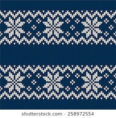 a blue and white knitted pattern with snowflakes on the edges, in two rows