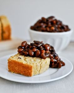 two pieces of bread on a plate with beans