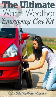 a woman is changing the tire on her car